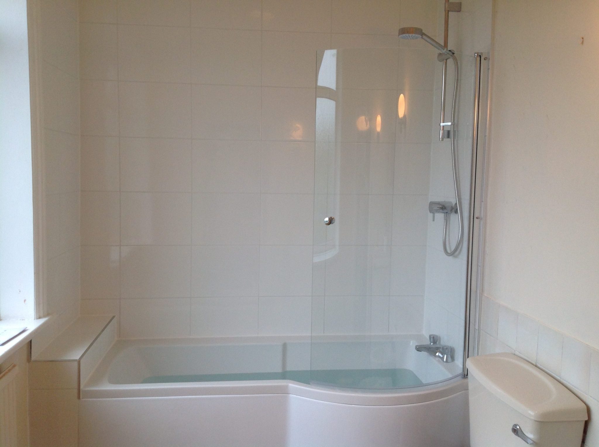 Basic and clean shower bath installation in Roundhay Plumber in Moortown