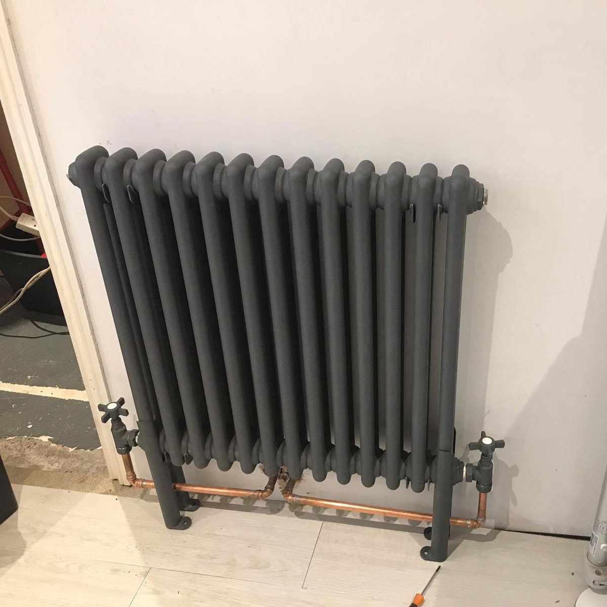 Anthracite column radiator fitted in Leeds_